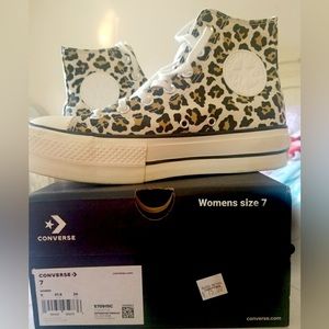 Young Woman’s High Top Converse
